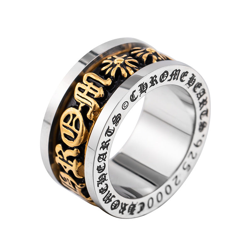 chrome hearts black and gold rotating letter cross flower ring